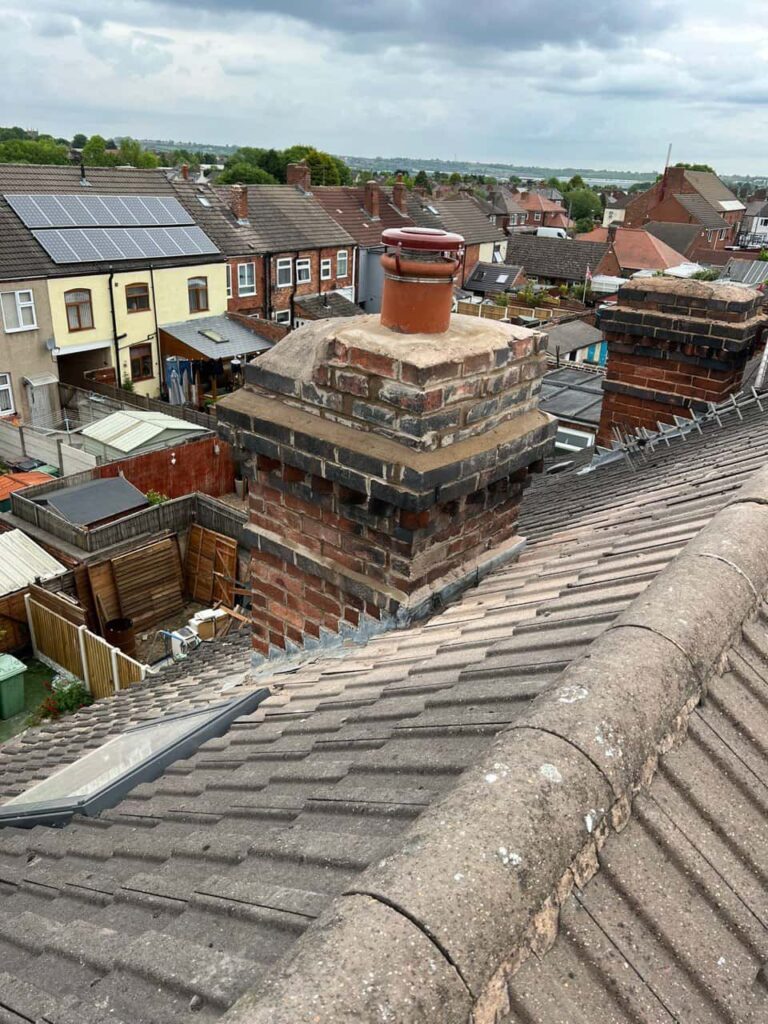 This is a photo taken from a roof which is being repaired by New Ollerton Roofing Repairs, it shows a street of houses, and their roofs